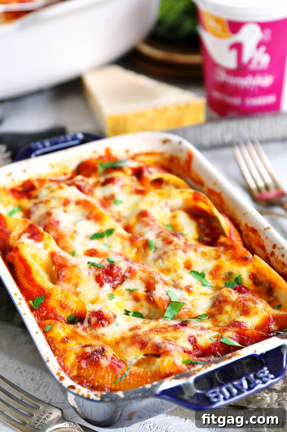 Stuffed Shells Leftovers Small baking dish with extra stuffed shells for individual servings.