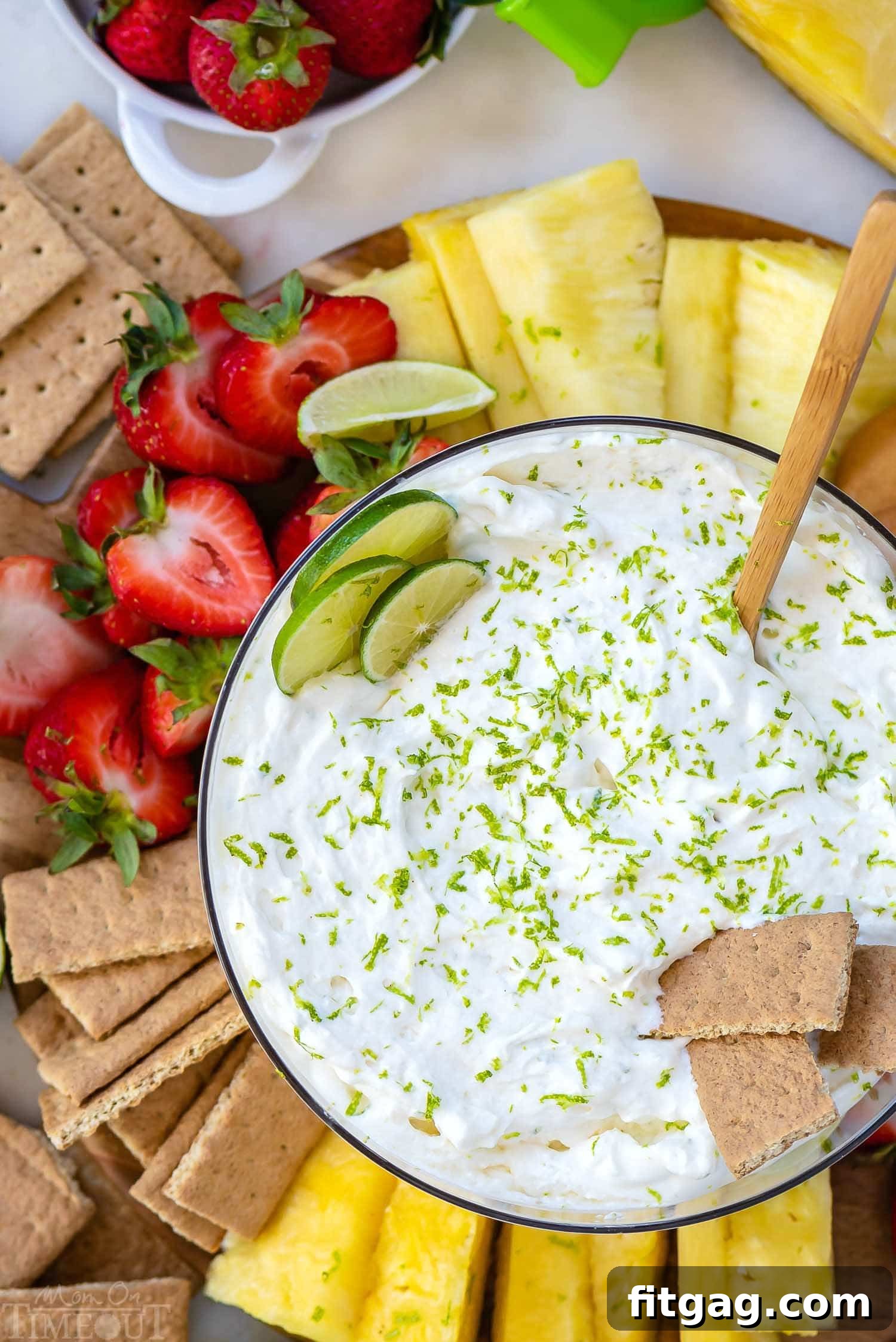 Quick & Easy Key Lime Fruit Dip for Parties - A Sweet and Tangy Delight Creamy Key Lime Pie Fruit Dip ready for serving with fresh fruit