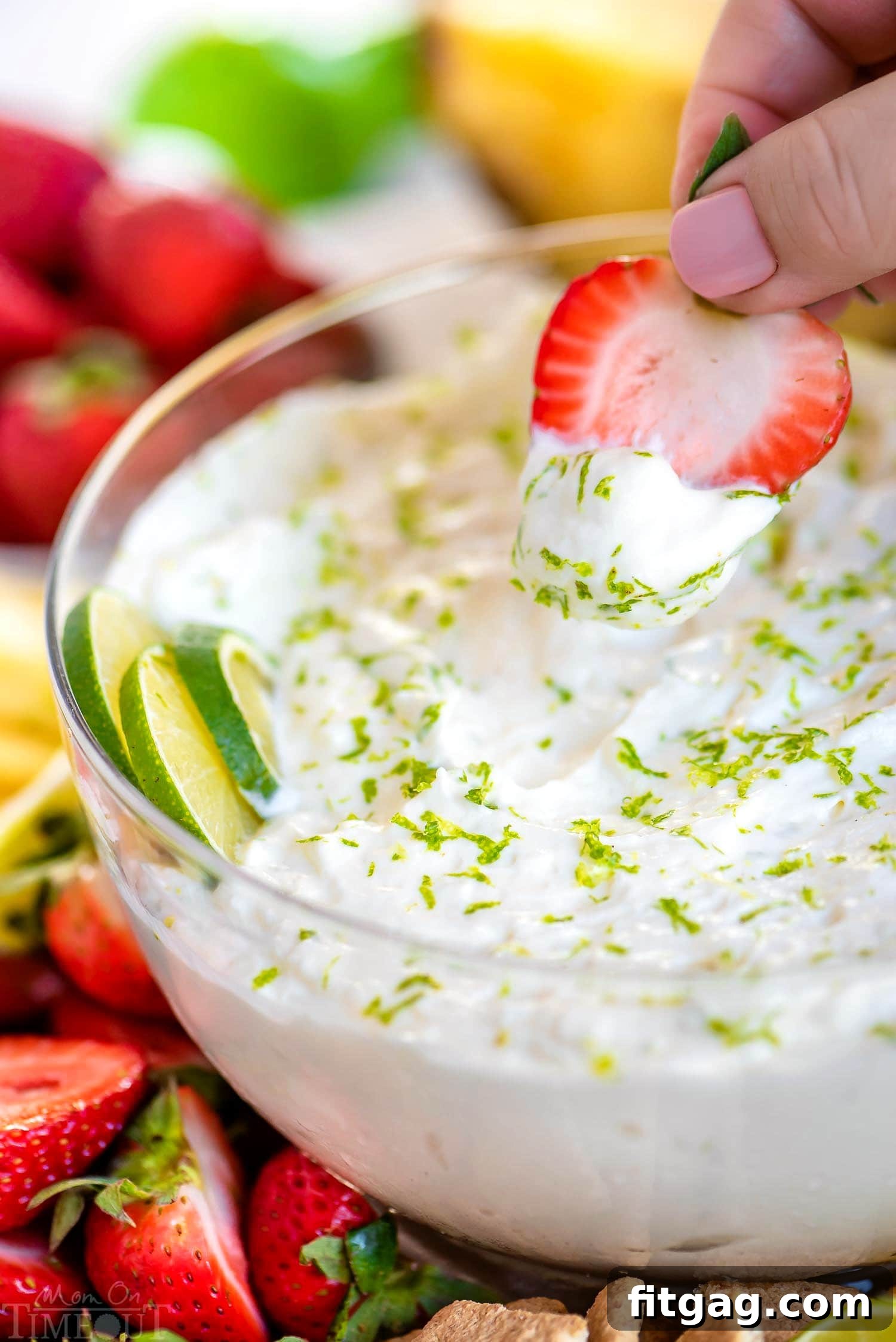 Zesty Key Lime Fruit Dip 4 Overhead shot of Key Lime Pie Fruit Dip in a bowl, garnished with lime zest
