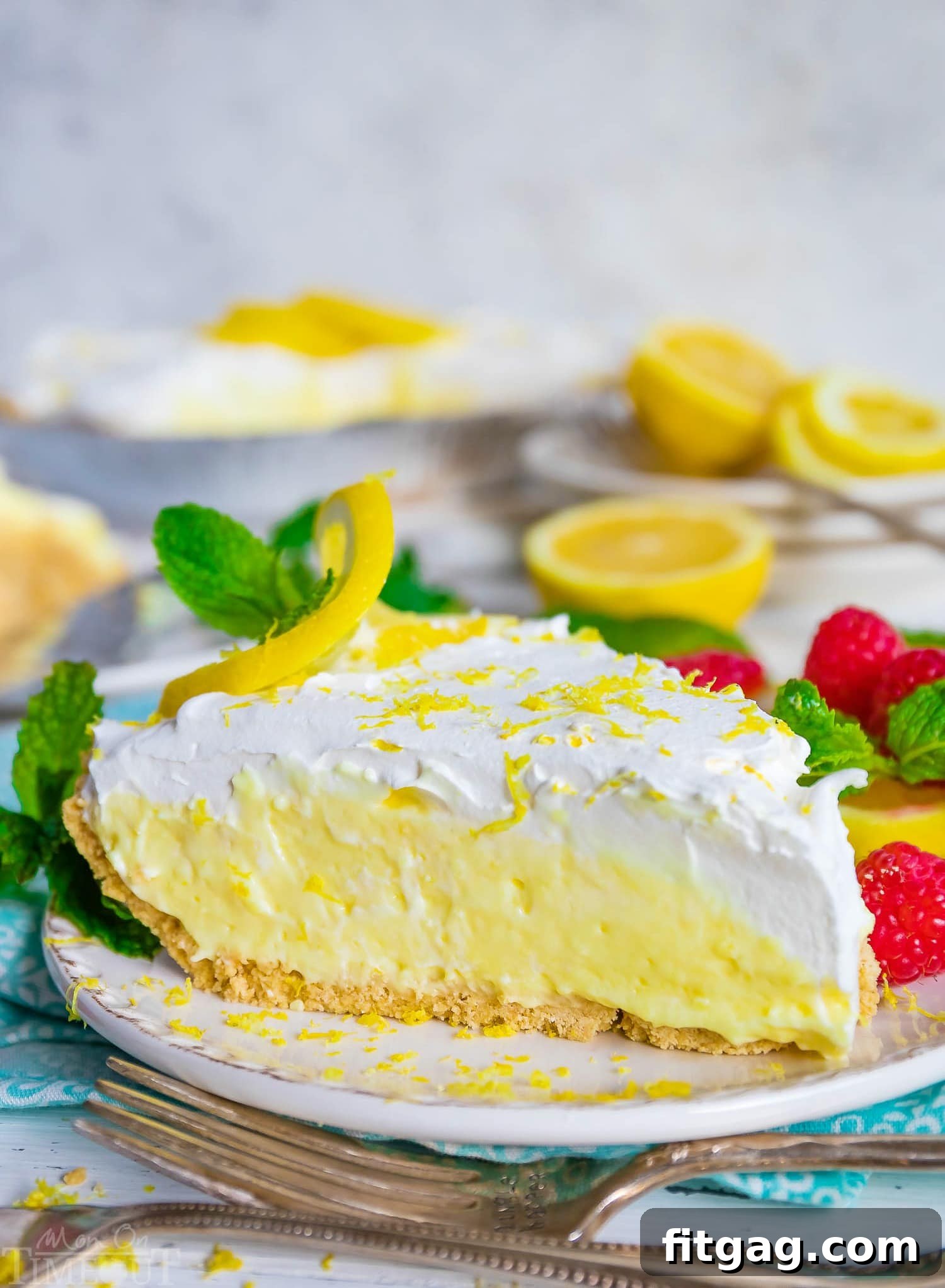 Zesty No-Bake Lemon Delight 5 A perfectly clean slice of creamy lemon pie served on a pristine white plate.