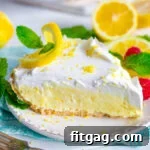 No-Bake Lemon Pie with whipped cream and lemon slices