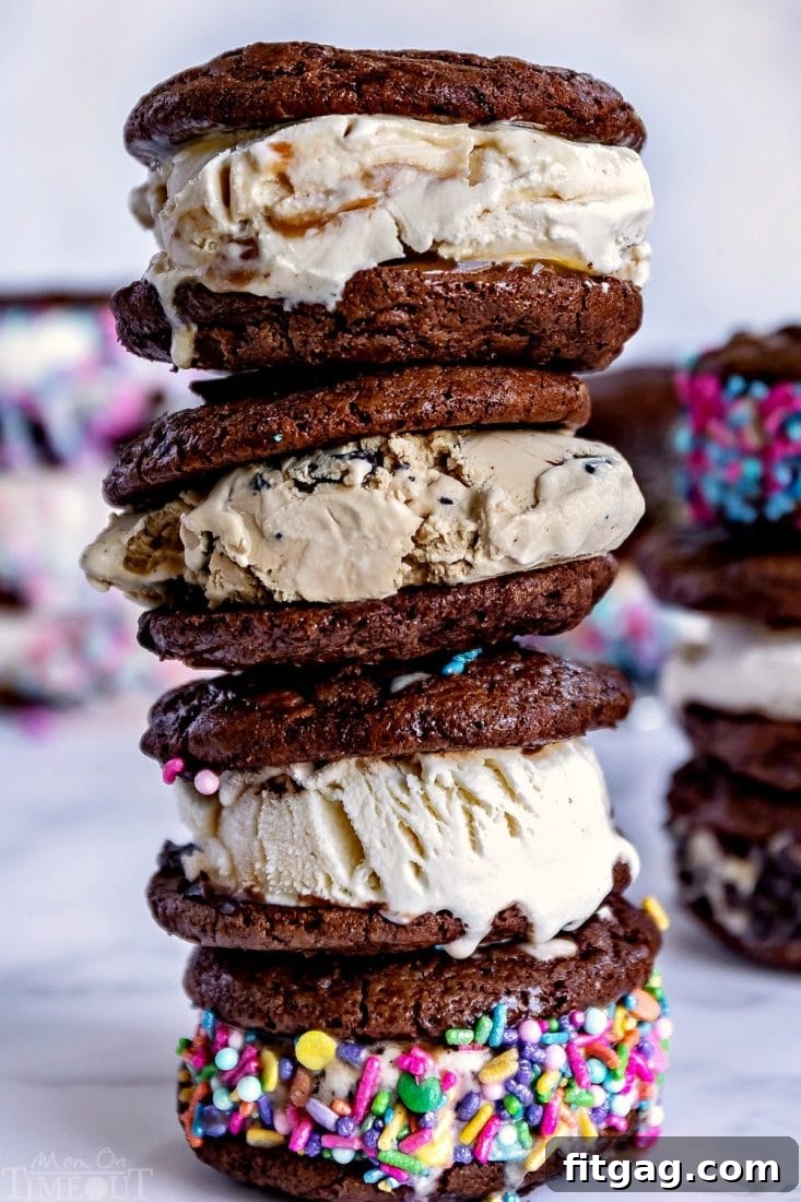 A towering stack of homemade brookie ice cream sandwiches, generously coated with colorful sprinkles, showcasing the irresistible appeal of this summer dessert.