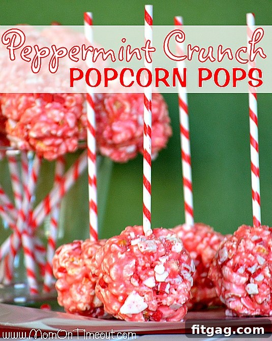 Delicious Marshmallow Peppermint Crunch Popcorn Ball Pops for Christmas