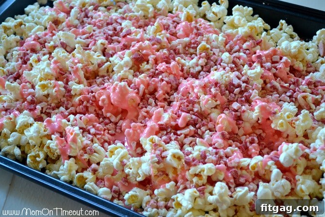 Mixing Popcorn, Marshmallows, and Peppermint Crunch for Holiday Treats