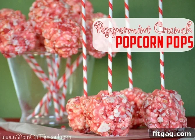 Close-up of a festive Marshmallow Peppermint Crunch Popcorn Ball Pop