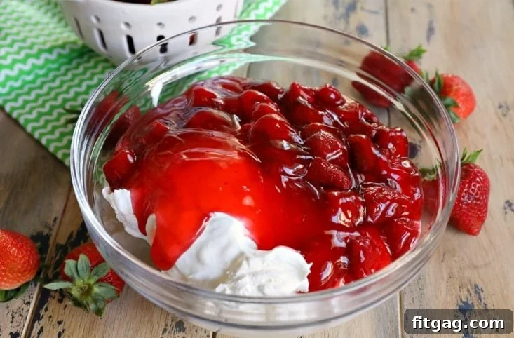Bowl of ingredients for Strawberry Fluff dessert salad