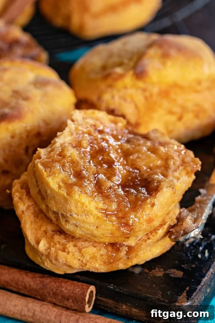 Enjoy sweet potato biscuits with brown sugar cinnamon butter for the ultimate treat Sweet potato biscuit recipe served with a generous amount of brown sugar cinnamon butter, inviting and delicious