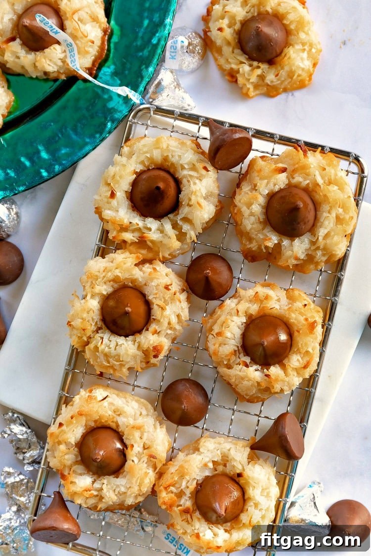 Top-down view of Coconut Macaroon Blossoms on a rustic wooden surface.