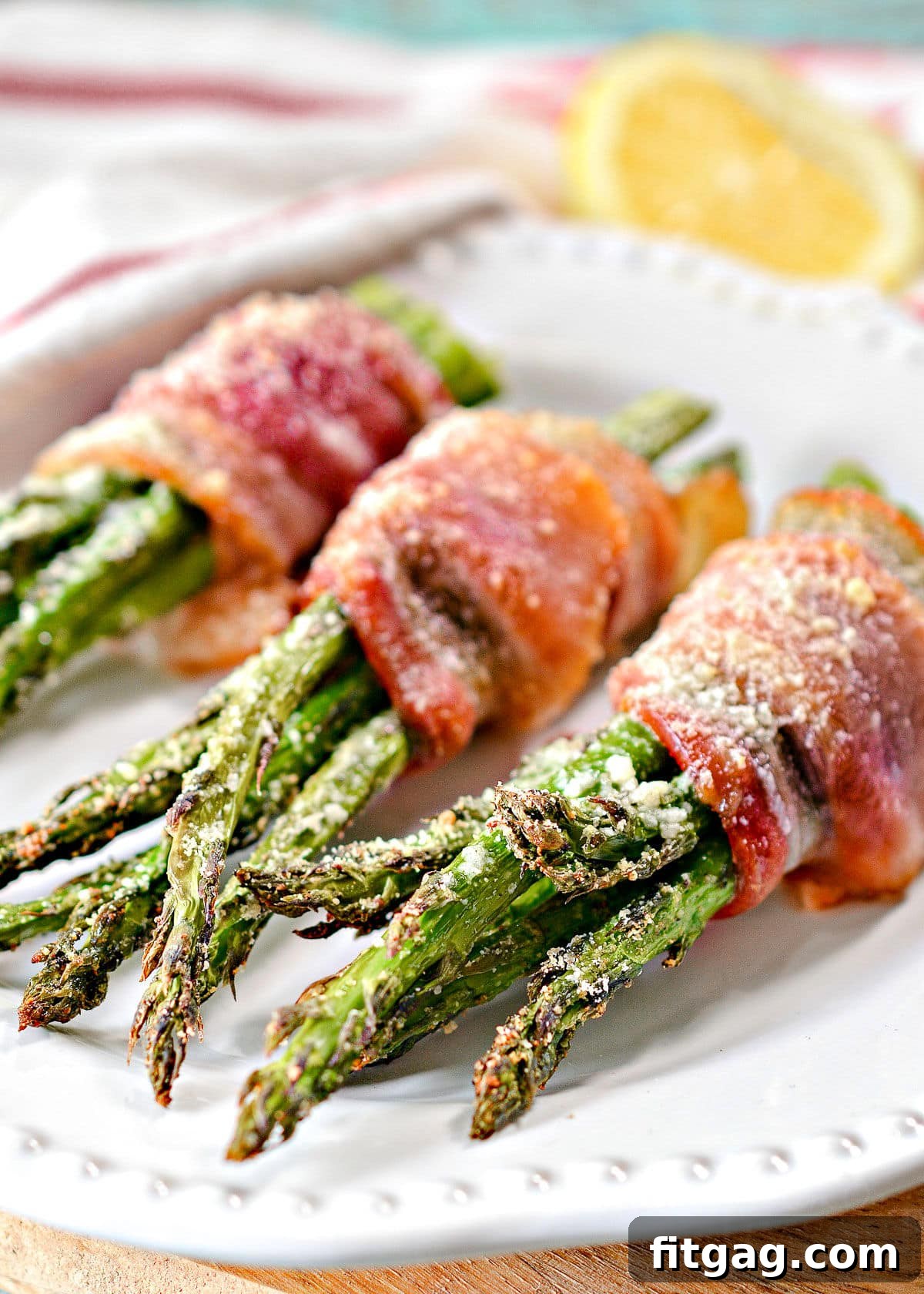 Oven-baked or air-fried bacon wrapped asparagus on a serving platter