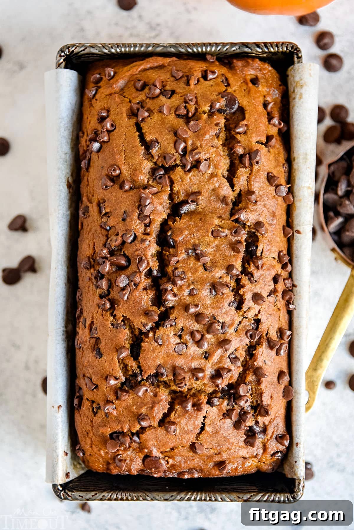 top down view of pumpkin bread still in loaf pan