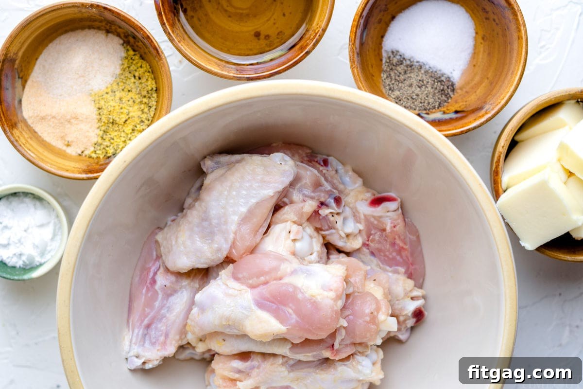 Irresistible Lemon Pepper Wings Baked or Air Fried 5 lemon pepper wings ingredients measured out in bowls