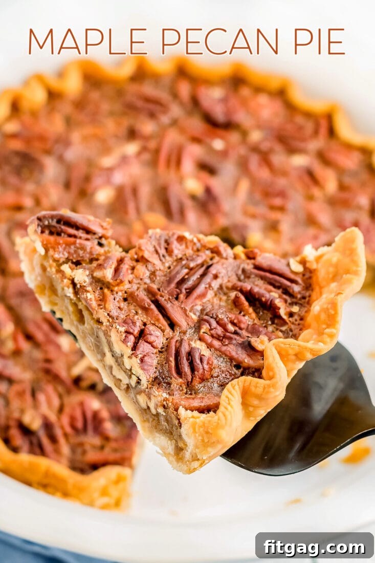 Decadent Maple Pecan Pie 2 A perfectly baked slice of Maple Pecan Pie being served, with the full pie visible in the background, inviting the viewer to indulge.