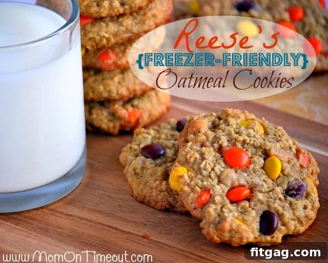 Irresistible Reese's Oatmeal Cookies: A Peanut Butter Lover's Dream Close-up of freshly baked Reese's Oatmeal Cookies, showing the melted peanut butter chips and colorful Reese's Pieces
