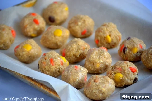 Flash Freezing Reese's Oatmeal Cookie Dough Reese's Freezer Friendly Oatmeal Cookies dough balls flash freezing on a baking sheet