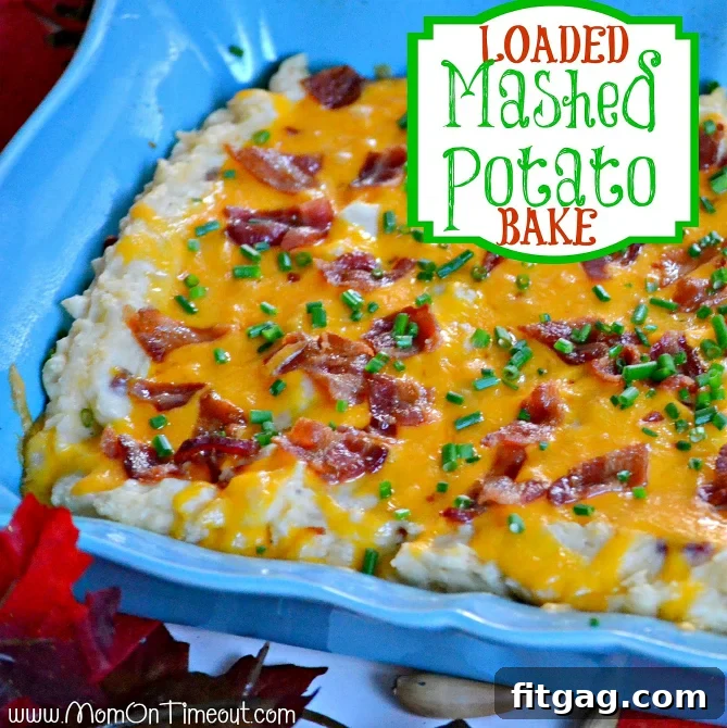 Creamy Loaded Mashed Potato Bake with melted cheese and crispy bacon, perfect for holidays