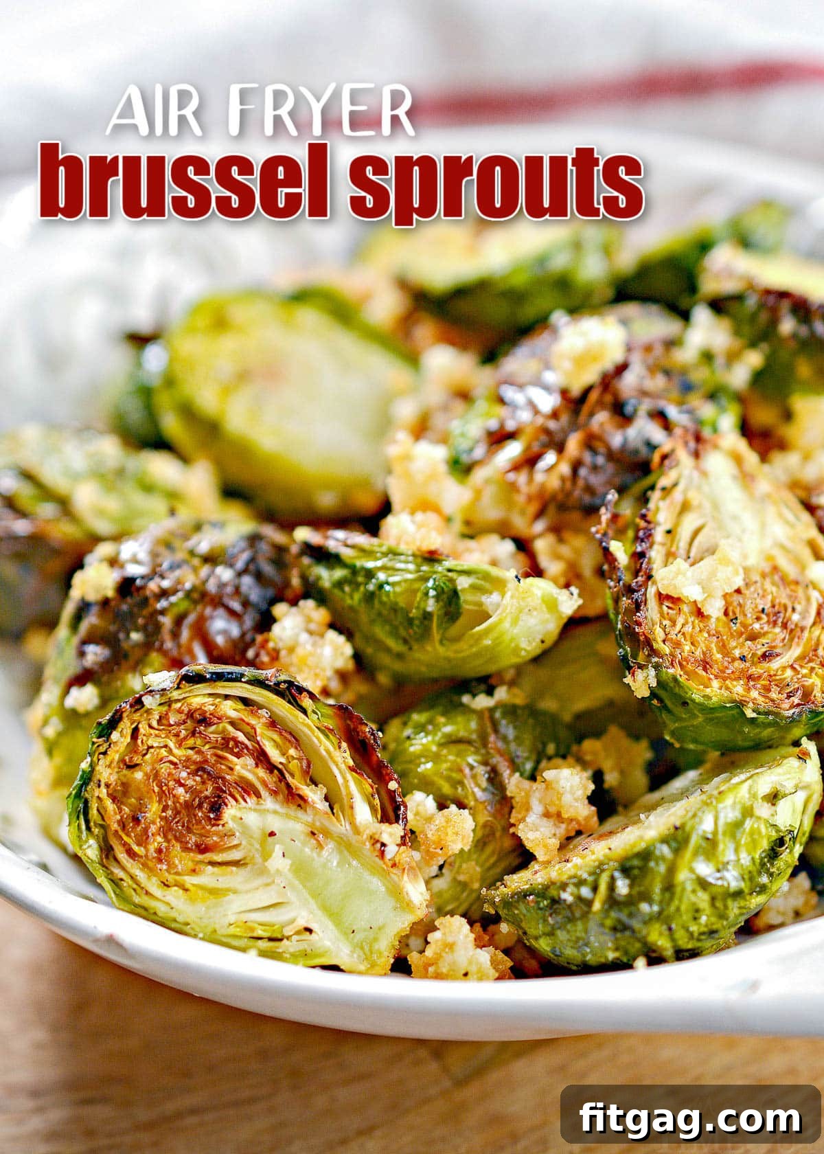 Crispy Garlic Parmesan Air Fried Brussel Sprouts 2 Crispy Air Fryer Brussels Sprouts seasoned with garlic and Parmesan in a white bowl, with a title overlay.