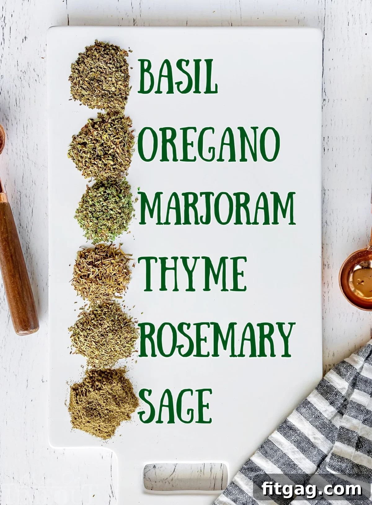 Italian seasoning ingredients, perfectly measured and labeled on a white cutting board.