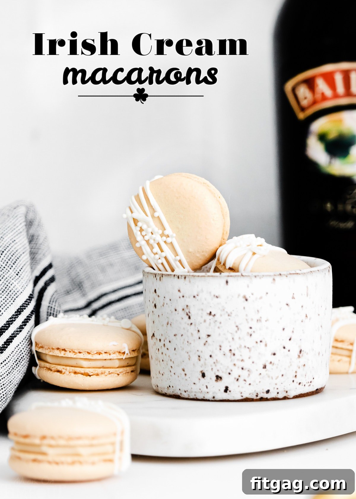 irish cream macarons next to bottle of baileys with title overlay.