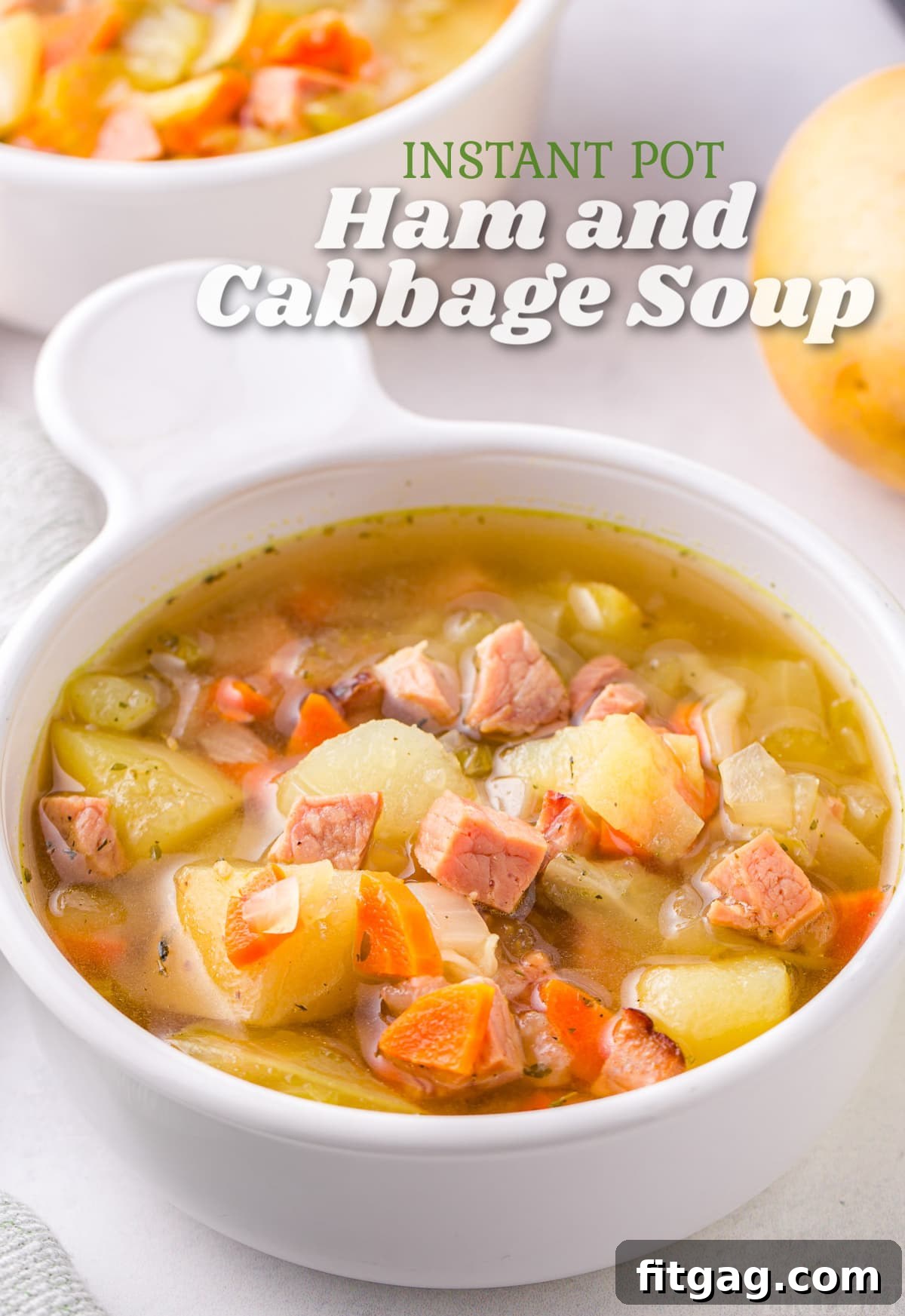 Hearty Instant Pot Ham and Cabbage Soup 2 A white bowl filled with comforting Instant Pot Ham and Cabbage Soup, featuring visible pieces of ham, cabbage, and vegetables. Image has a title overlay.