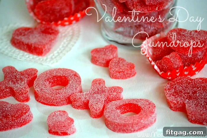 Assortment of Homemade Valentine's Day Gumdrops in various shapes including hearts, Xs, and Os, ready for gifting. #valentinesdaycandy #diygifts