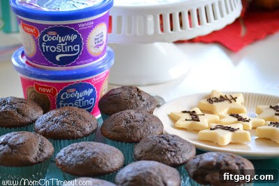 Delicious chocolate cupcakes frosted and adorned with chocolate stars.