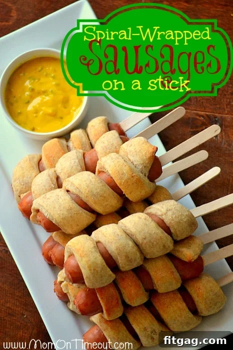 Delicious Spiral-Wrapped Sausages on a Stick, perfect for game day or any party. Made with your favorite sausage or hot dog, this recipe is ideal for feeding a crowd.