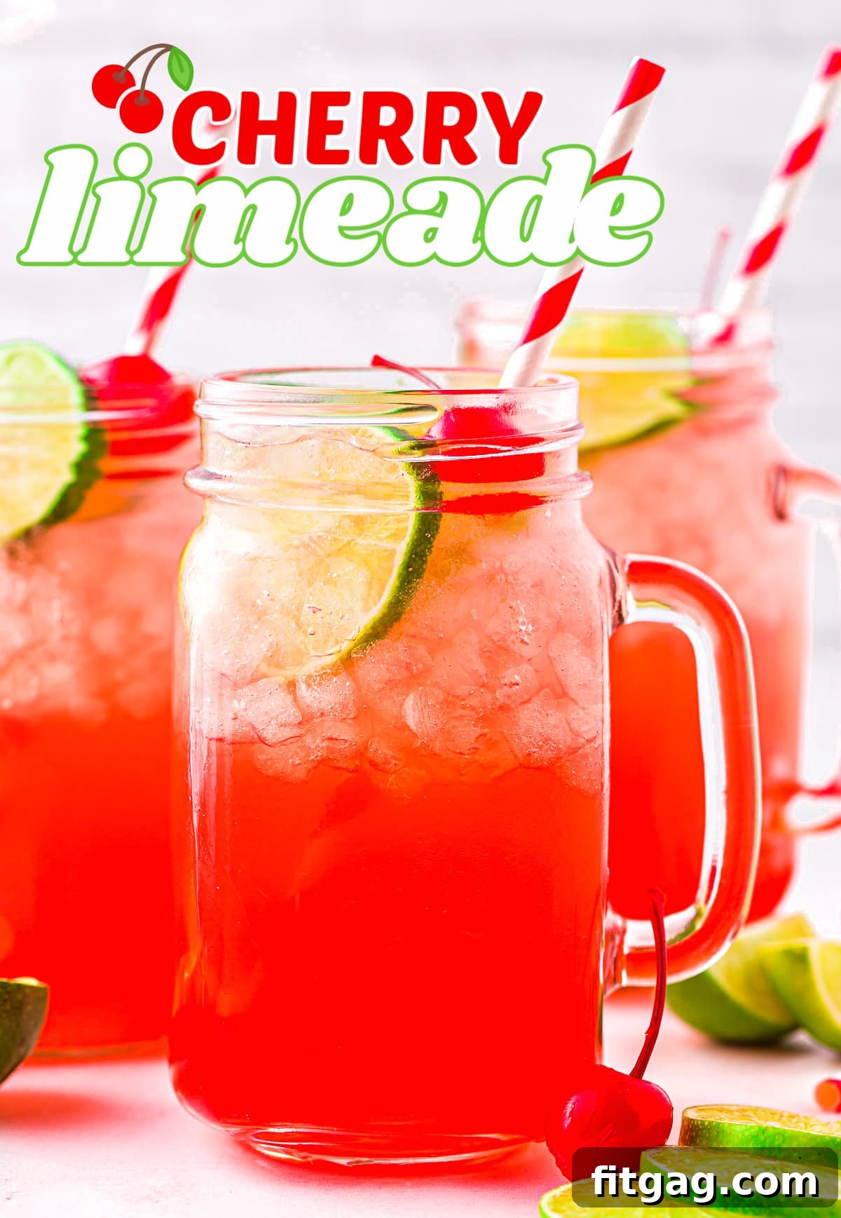 Three mason jar glasses brimming with vibrant red cherry limeade, garnished with fresh lime slices and bright maraschino cherries, alongside red and white striped paper straws. A quintessential summer drink scene, inviting refreshment.