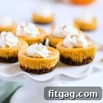 Mini pumpkin cheesecake on white cake stand with title