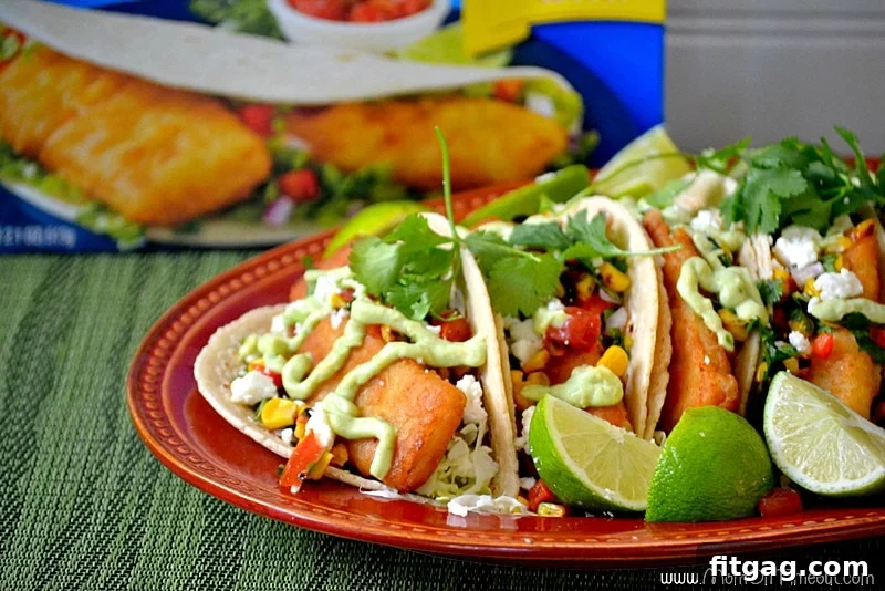 Close-up of Fish Tacos with Roasted Corn Salsa and Avocado Sauce