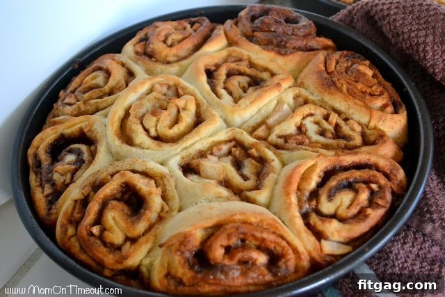 Freshly baked caramel apple sticky buns cooling in the pan, waiting to be inverted.