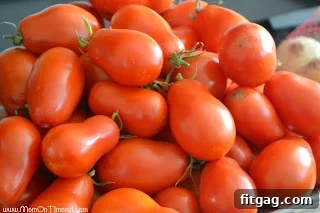 Close-up of fresh, ripe tomatoes, the essential ingredient for an easy homemade pasta sauce.