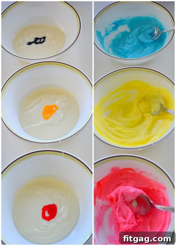 A hand gently dropping rounded tablespoonfuls of colorful coconut mixture onto waxed paper, forming the base for homemade Easter nests.