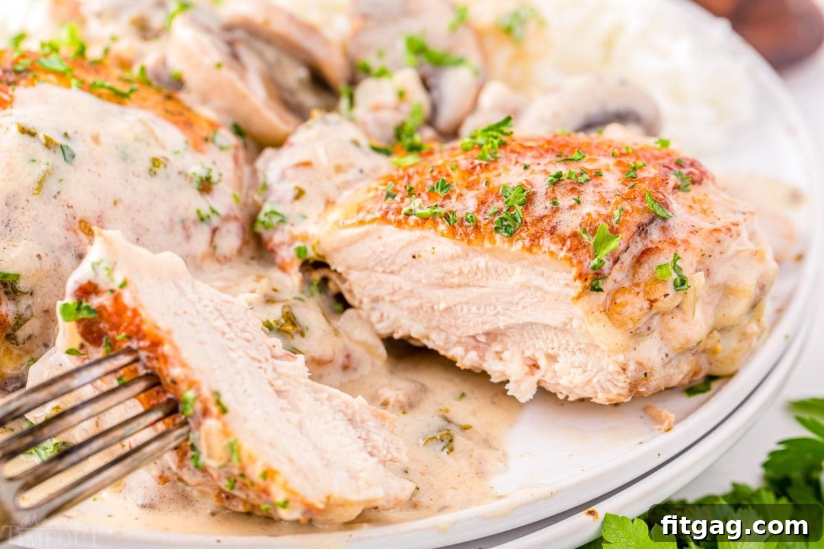 Tender Chicken in Velvety Sauce 7 chicken thigh cut open to reveal juicy meat.