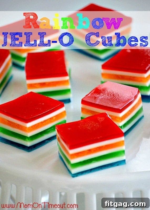 Vibrant Rainbow Jello Cubes arranged attractively on a plate, ready to be served at a party or special occasion.