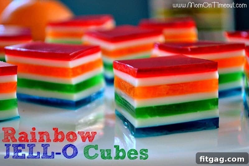 A collection of Rainbow Jello Cubes artfully arranged, demonstrating the simplicity and visual appeal of this easy dessert.