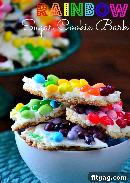 Confetti Sugar Cookie Bark 10 A close-up shot of the finished Rainbow Sugar Cookie Bark recipe, highlighting the colorful candies and the easy preparation steps. Perfect for celebrations.