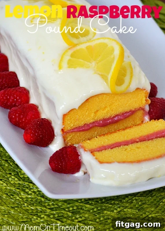 Lemon Raspberry Pound Cake | MomOnTimeout.com - Lemon Cream Cheese Frosting and a Raspberry Filling make this dessert extra special! #lemon #raspberry #recipe #dessert Exquisite Lemon Raspberry Pound Cake with Cream Cheese Frosting - MomOnTimeout.com. A perfect blend of zesty lemon and sweet raspberry, topped with a rich cream cheese frosting. An easy, elegant dessert recipe for any occasion. #lemon #raspberry #poundcake #creamcheesefrosting #dessertrecipe #easybaking