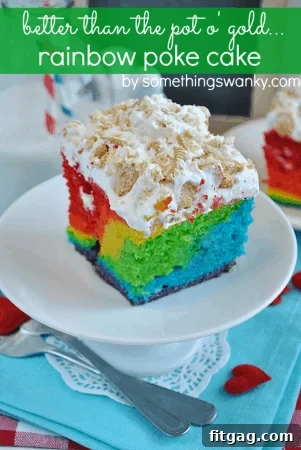 Colorful Rainbow Poke Cake, a delightful dessert with vibrant jello-filled holes and whipped topping.