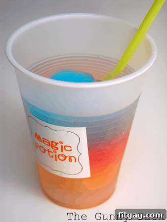 Magic Potion Rainbow Drink tutorial, a layered colorful beverage that's visually stunning and fun for parties.