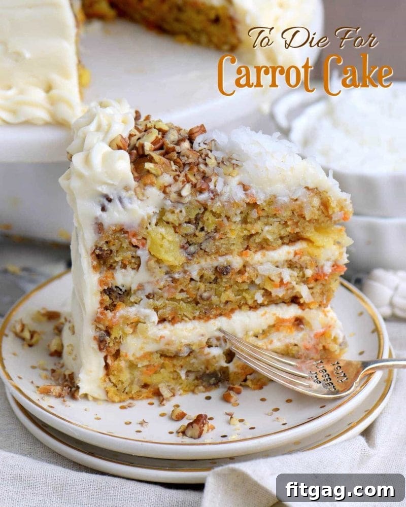 A slice of unbelievably moist carrot cake with rich cream cheese frosting, garnished with pecans.