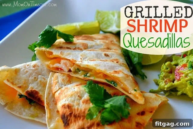Close-up of golden brown grilled shrimp quesadillas with melted cheese and shrimp peeking out