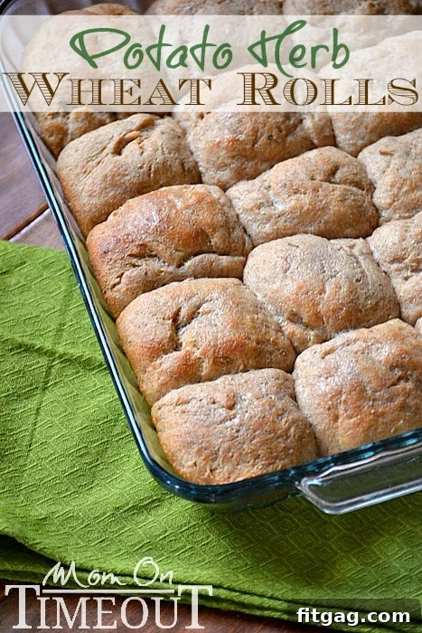Freshly baked Easy Homemade Potato Herb Whole Wheat Rolls, golden brown and garnished with herbs, ready to be served. A delicious addition to any meal, perfect for family dinners. #rolls #bread #recipe #wholewheat
