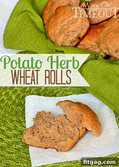 A basket full of warm, freshly baked Easy Homemade Potato Herb Whole Wheat Rolls, ready to be enjoyed with a meal. Comforting and delicious. #dinnerrolls #breadmaking #homebaking