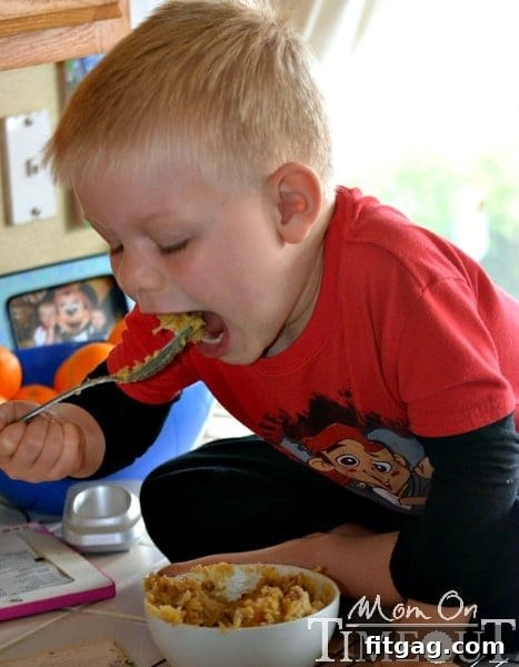 Heavenly Raspberry Coconut Squares 2 Bryce-eating-frosting