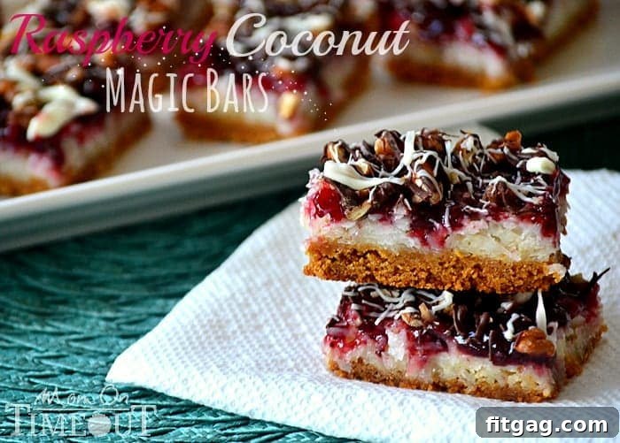 Raspberry Coconut Magic Bars | MomOnTimeout.com A delicious bar for the coconut lover in your life! #coconut #magicbar #bar #dessert #recipe Raspberry Coconut Magic Bars | MomOnTimeout.com A delicious bar for the coconut lover in your life! #coconut #magicbar #bar #dessert #recipe
