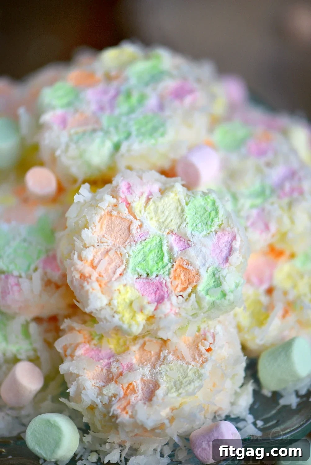 Three core ingredients for Easter Cathedral Candy: a bag of coconut flakes, a box of CandiQuik, and a bag of colorful mini marshmallows.