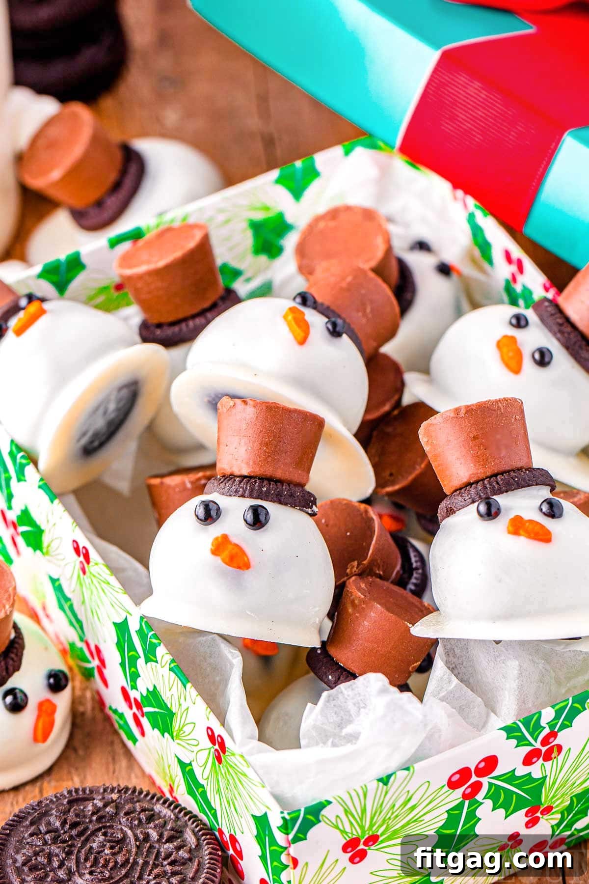 Disappearing Snowman Oreo Truffles 6 snowman oreo balls in a christmas box ready to be enjoyed.