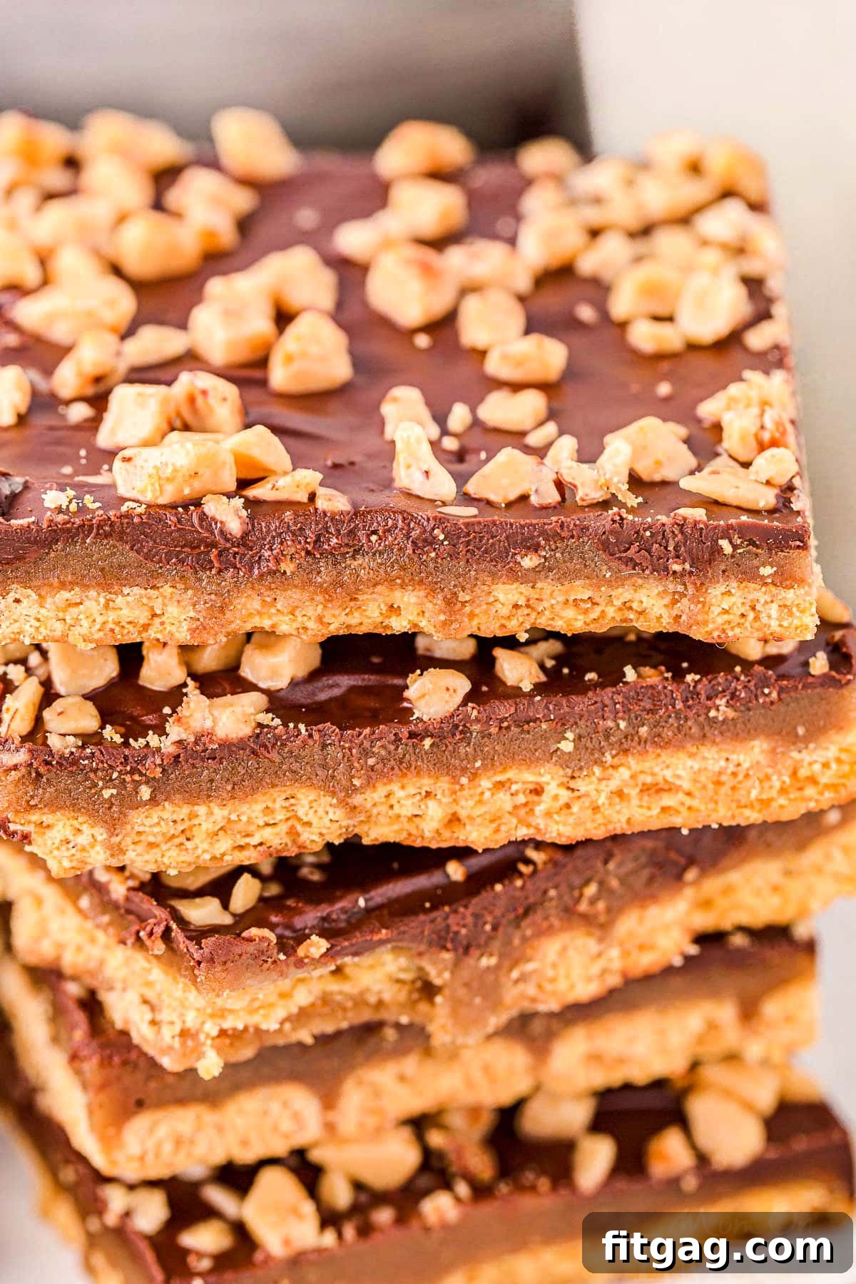 Decadent Graham Toffee Bark 6 close up look at stack of graham cracker toffee topped with heath toffee bits.