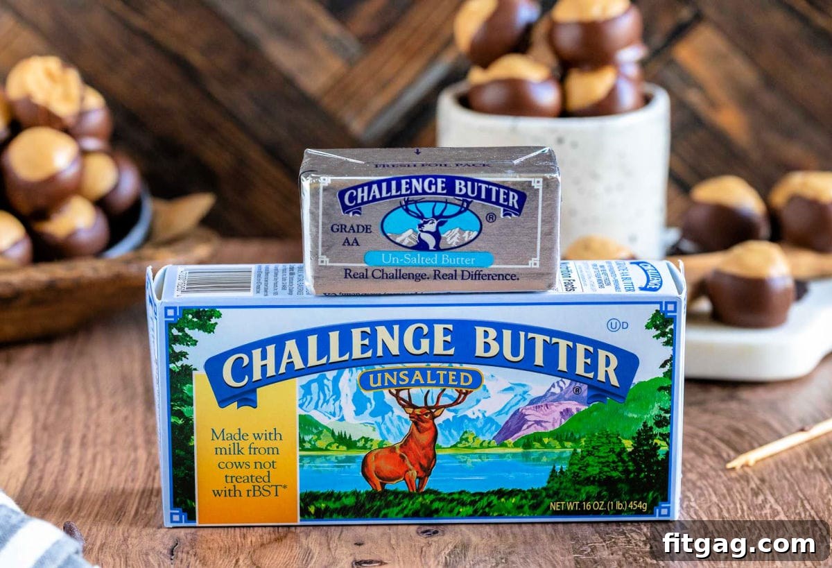 Ohio's Buckeye Story 5 A pristine box and stick of Challenge butter are elegantly placed in front of a delightful arrangement of buckeye candy, perfectly poised for enjoyment.