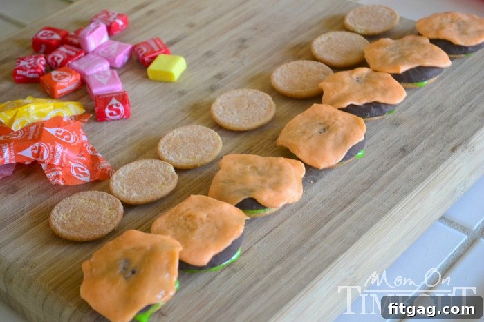 Sweet Cheeseburger Sliders 4 Melted orange Starburst candy shaped like cheese slices for cookie sliders.